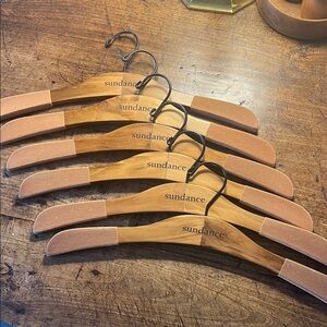 Sundance Wooden Hangers with Tan Padded Shoulder Grips